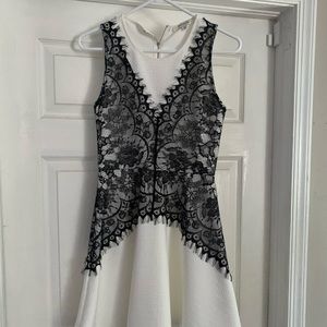 Black and white mini dress. fits like a small.